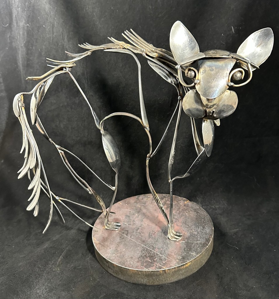 metal halloween cat made of forks and spoons