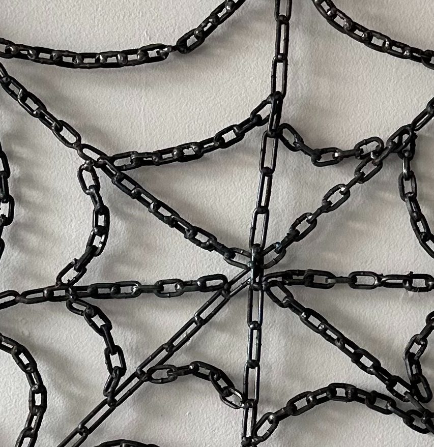 spiderweb made out of chains, metal sculpture wall hanging